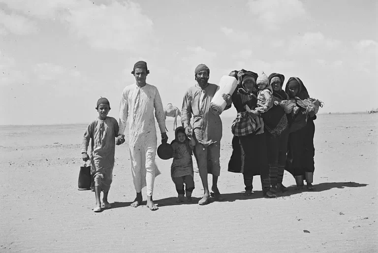 Sephardic Population The Mizrahi Jews featuring A JEWISH YEMENITE FAMILY WALKING THROUGH THE DESERT TO A RECEPTION CAMP SET UP BY THE "JOINT" NEAR ADEN.