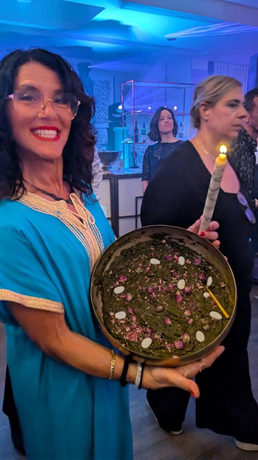 Moroccan friend of the family holding henna bowl for Sephardic wedding