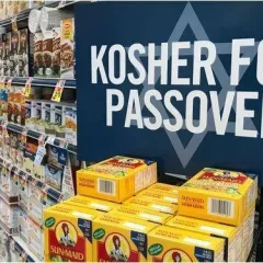 Supermarket Passover shopping section with 'Kosher for Passover' sign and Sun-Maid raisins, featuring Sephardic-specific approved grocery items and brand recommendations.